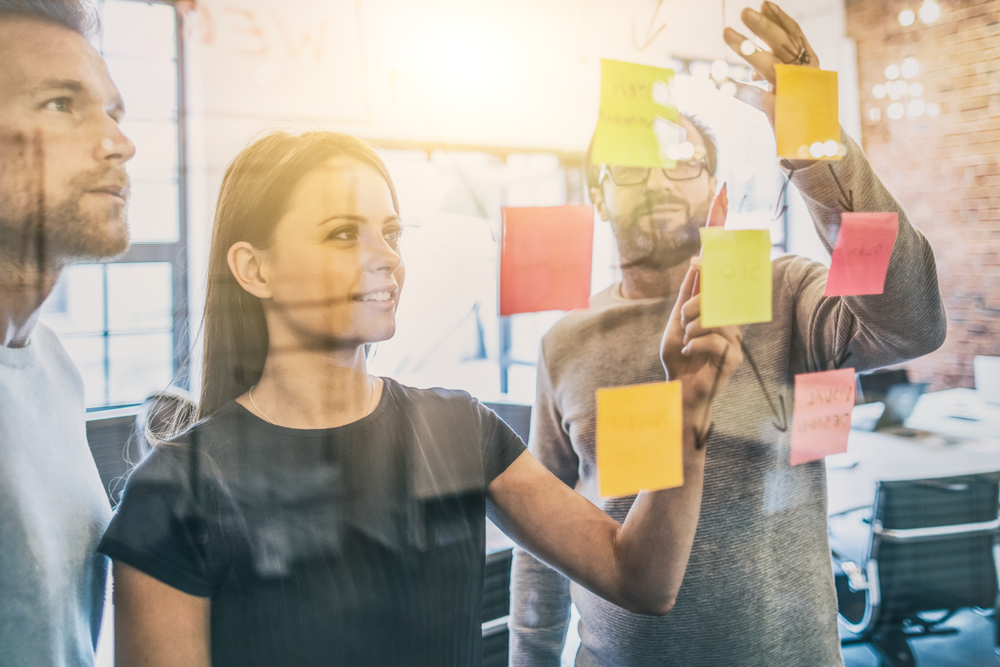 Creating thinking business meeting in an article on funnel building on crownsvillemedia.com