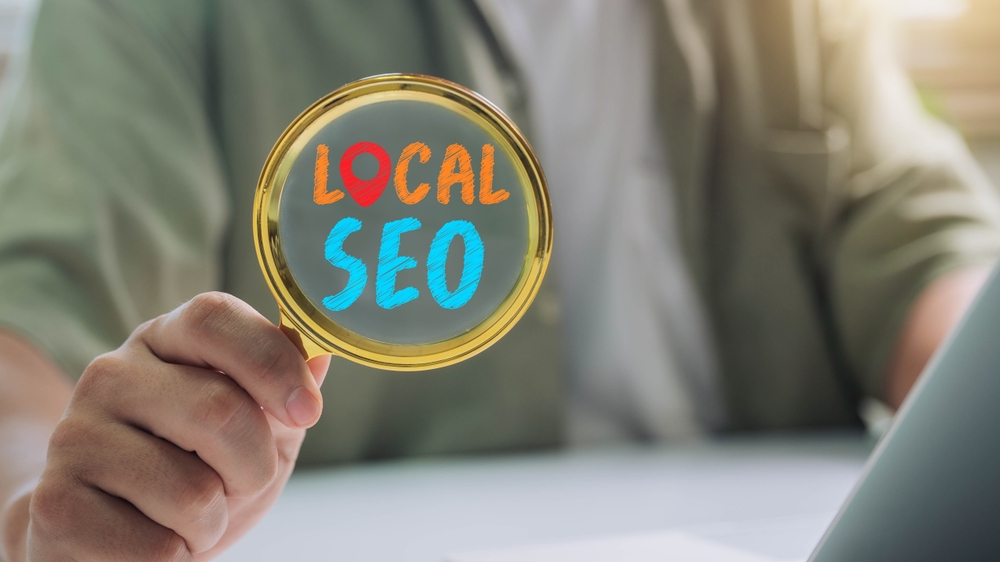 | crownsville media - seo, ai visibility & digital marketing for small business owners Magnifying glass for local seo article by crownsville media