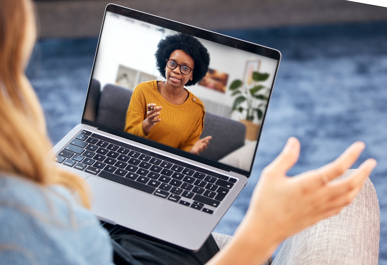 | crownsville media - seo, ai visibility & digital marketing for small business owners | crownsville media - seo, ai visibility & digital marketing for small business owners Woman video call and psychologist on laptop screen because her google ads for therapists is filling her practice