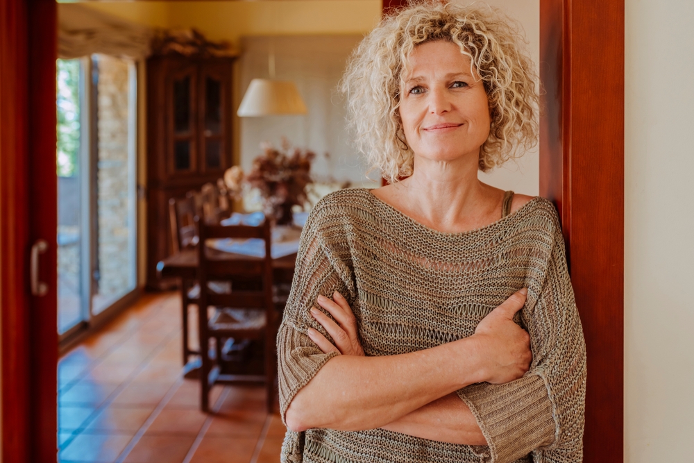 Middleagedwomanwithcrossedarmsworkathomefor | crownsville media - seo, ai visibility & digital marketing for small business owners | crownsville media - seo, ai visibility & digital marketing for small business owners Woman with her arms crossed